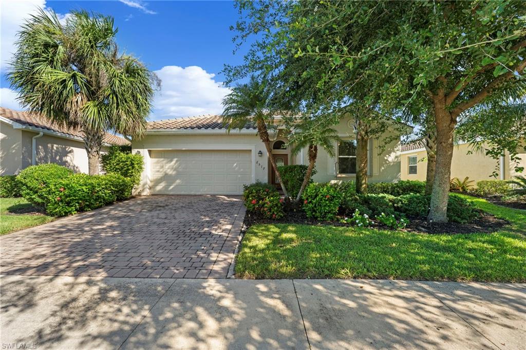 WELCOME TO YOUR SLICE OF PARADISE IN BELLA VIDA! Discover the perfect blend of SPACE, COMFORT and RESORT-STYLE LIVING in this beautifully designed 4-bedroom, 3-bath TREVI MODEL by Lennar, nestled within the desirable GATED COMMUNITY of Bella Vida in Cape Coral! Thoughtfully designed for both everyday living and effortless entertaining, this inviting home features a spacious open-concept floor plan where the kitchen, dining area and great room flow seamlessly together. The well-appointed kitchen boasts a generous center island, ample cabinetry and plenty of space to gather, while the expansive living area creates the perfect setting for entertaining family and friends. A desirable SECOND ENSUITE BEDROOM provides added privacy and comfort for overnight guests or multigenerational living. Step outside to your SCREENED LANAI and enjoy peaceful POND VIEWS, beautiful wildlife and the tranquility of your own backyard retreat! The spacious FENCED YARD offers plenty of room for outdoor activities, pets and play, while providing separation from the pond. Beyond your front door, BELLA VIDA offers an exceptional lifestyle within its gated setting, with amenities including a resort-style community pool, clubhouse, fitness center, tennis and pickleball courts, and playground. EVEN BETTER? The HOA fees include landscaping, irrigation water, annual mulching, high-speed internet and cable service with three DVRs, making everyday living that much easier! Conveniently located near shopping, dining, entertainment and everyday essentials, this home delivers the perfect combination of LOCATION, LIFESTYLE and VALUE. Whether you're looking for room to grow, space to entertain or simply a peaceful Florida retreat, this Bella Vida beauty checks all the boxes. YOUR FLORIDA DREAM HOME AWAITS! Some photos include reality renovation/ reality staging. *THIS PROPERTY INCLUDES DESIGN SERVICES, MAKING FURNISHING THIS PROPERTY EASY FOR YOUR BUYER*