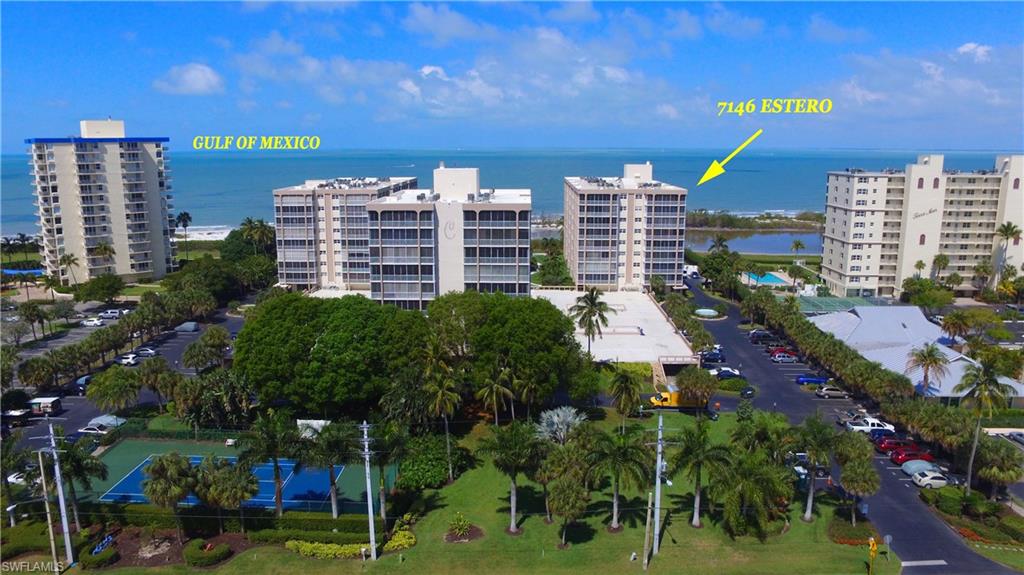 Here's your chance to own a 2BR/2BA unit in the Gulf side Creciente condo community.  One of the best features of this unit is its spacious lanai.  The tiled lanai has glass sliding windows which create a room that can be enjoyed in all types of weather.  It can also be accessed from both bedrooms.  Both bedrooms are spacious.  The owner's suite has a private bath and 2 closets.  The guest bedroom area has a louvered door, making it a private suite also.  There's also an in-unit laundry room with full size washer and dryer.  The unit has a prime parking space as well as extra storage.  Creciente is an active gulf-front community located at the south end of Fort Myers Beach and is within easy walking distance to shopping and restaurants.  Amenities include a resort-style pool, fitness center, tennis court, billiards and extra storage.  If you are a boater, there's a full service marina across the street offering boat sales, rental and storage. There's a convenient trolley stop across the street.  Take the trolley to the island's north end or go south to Lovers Key State Park.