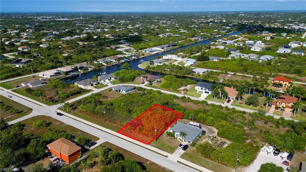 This charming single-family residential lot is located in South Gulf Cove, a deed-restricted waterfront community offering city water and sewer connections. With a desirable southern front exposure, you'll enjoy breathtaking sunset views right from your porch. The community has a voluntary Homeowners’ Association membership, granting access to the South Gulf Cove Park, which features a boat ramp, picnic shelter, playground, and great fishing spots.

Located just 12 miles from the pristine Englewood beaches and close to the famous Boca Grande on Gasparilla Island, this lot is also surrounded by several golf courses. For sports enthusiasts, Charlotte Sports Park, the spring training home of the Tampa Bay Rays, is just a short drive away. This peaceful neighborhood provides a perfect blend of convenience and tranquility.