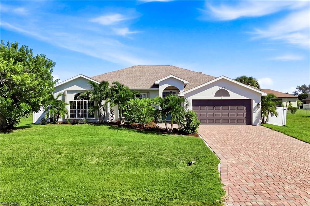 **WELCOME TO YOUR FLORIDA PARADISE!** Discover the possibilities in this spacious **3-bedroom, 2-bathroom pool home** located in desirable Southwest Cape Coral! Offering **1,934 square feet of living space**, this home combines comfort, functionality, and the Florida lifestyle you've been dreaming of!
Step inside and appreciate the recent updates, including **beautiful new quartz countertops and updated shower tile**, adding a fresh, modern touch to the home. A **2021 roof** provides another valuable improvement and added peace of mind.
Step outside to your own private tropical retreat featuring a **sparkling swimming pool, relaxing spa, and poolside tiki hut!** Whether you're hosting gatherings with friends and family, enjoying a refreshing swim, or unwinding under the tiki hut, this outdoor space is designed for making the most of Southwest Florida's year-round sunshine.
Conveniently located near shopping, dining, entertainment, and everything Cape Coral has to offer, this home is ideal for full-time residents, seasonal homeowners, or anyone looking to embrace the Florida lifestyle.

**Your Southwest Florida paradise awaits! Schedule your private showing today!**