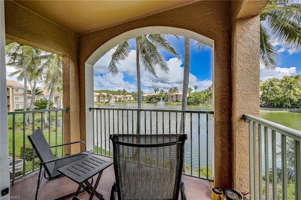 Beautiful end unit with your own private entrance and stunning lake views from the lanai. This cozy 1 bedroom, 1 bath condo is offered turnkey furnished and ready for you to enjoy. Featuring driftwood hickory vinyl flooring, vaulted ceilings, an open floor plan, crisp white kitchen with breakfast bar and laundry room with washer and dryer. It’s the perfect Naples Getaway, Investment or Year-Round Retreat. This gated community offers a resort-style clubhouse with large pool and spacious pool deck overlooking the sparkling lake, luxurious spa area, exercise room, billiards room, community room, tennis courts, cabana & BBQ area. Ideally located in the heart of Naples. Less than 10 minutes from Olde Naples & downtown 5th Avenue shopping, dining, art galleries, theatre and the pristine Gulf beaches. Enjoy all that Naples has to offer.