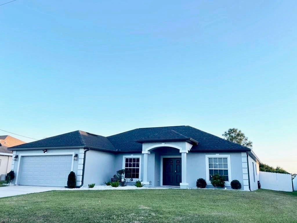 This Newly Renovated 1,698 Sq Ft. home is Move -In Ready. 
The home features 3 Bedrooms, 2 Baths plus a Den/Office, 2 car garage and marble look Tile flooring. As you walk through the double door entry you will notice the spacious Open Floor Plan perfect for entertaining or relaxing. The Kitchen has White Cabinets, Granite countertops, and an Island. 
The Owner’s Suite is spacious and has access to the patio.
The Owner’s bath has a huge walk-in shower with decorative tile, a rainfall shower head and a double sink Quartz Vanity. 
It has a screened patio with a paver walkway leading to the large backyard that is perfect for a pool. 
The new roof was put in 2018 and the fence was added in 2019. 
Located in SW Florida, one of the fastest growing areas of the country, minutes away from shopping centers, restaurants and schools. A short drive to SW FL International Airport, Fort Myers and the beaches. Quick access to Gunnary Rd, Sunshine Blvd, Lee Blvd and State Road 82. 
Schedule your showing today to view all the details of this beautiful home!