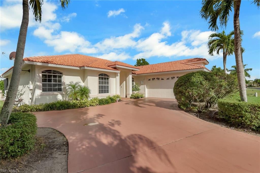 Experience the best of the Southwest Florida lifestyle in this beautifully situated 3-bedroom plus den, 2-bath pool home in the highly sought-after gated community of Spanish Wells. Built in 2002 and surrounded by lush tropical landscaping, this residence offers exceptional privacy and a desirable western exposure, creating the perfect backdrop for spectacular sunsets.

Designed for both everyday living and effortless entertaining, the spacious floor plan offers multiple gathering areas, including a welcoming great room as well as formal living and dining spaces. The seamless connection between the interior and outdoor living areas makes it easy to enjoy the Florida sunshine year-round.

Step outside to the expansive screened lanai, where a private pool and generous covered area create an inviting outdoor retreat. Whether relaxing poolside, entertaining friends, or dining alfresco in the shade of the covered lanai, this private setting captures the essence of relaxed Southwest Florida living.

Homeowners within Spanish Wells are in a unique position to enjoy optional membership at Spanish Wells Golf & Country Club, which offers an engaging and active lifestyle with an impressive array of amenities. The club features a 27-hole championship golf course, an aqua range and chipping area, two putting greens, expert golf professionals and a well-appointed pro shop. Beyond golf, members can enjoy three Har-Tru tennis courts, three Har-Tru bocce courts, four pickleball courts, a fitness center with classes, and a relaxing heated tropical pool. The 32,000-square-foot clubhouse serves as the social hub, offering distinctive dining led by a renowned chef, along with a calendar of entertaining member events.  Ideally positioned in the heart of Bonita Springs, Spanish Wells offers a refined Southwest Florida lifestyle just minutes from beautiful Gulf beaches, exceptional shopping, dining, and entertainment. Whether envisioned as a sophisticated seasonal retreat or a year-round residence, this inviting setting provides the privacy, comfort, and effortless lifestyle that make Southwest Florida such a sought-after place to call home.