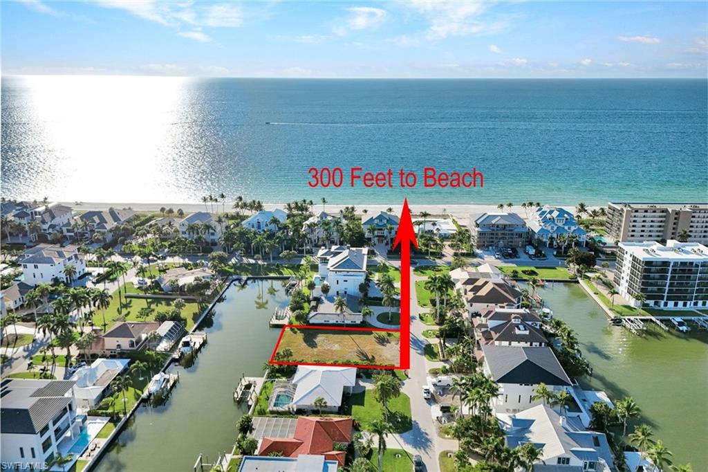 Walk to the beach and keep your boat in the backyard at 112 Seabreeze Avenue. This cleared waterfront lot in Conners Vanderbilt offers one of the most desirable lifestyle combinations in Naples. Enjoy true southern exposure, water views, direct Gulf access, and a raised seawall already in place. The property can accommodate a boat up to forty two feet, creating the perfect setup for anyone who loves both boating and the beach.

The seller has fully engineered building plans that have already been signed for this specific lot. This gives you a valuable head start on design and permitting and saves both time and money.

Best of all, the white sand of Vanderbilt Beach is only a few steps away, and the exciting new Parosio Beach Club is underway nearby, bringing an elevated coastal experience with exceptional dining, amenities, and beachfront lifestyle that will further enhance this already premier location.

You are also minutes from Mercato, Waterside, The Ritz Carlton, and the shopping and dining of Old Naples.

This is an exceptional opportunity to create a stunning new coastal home in one of Naples most sought after waterfront communities.