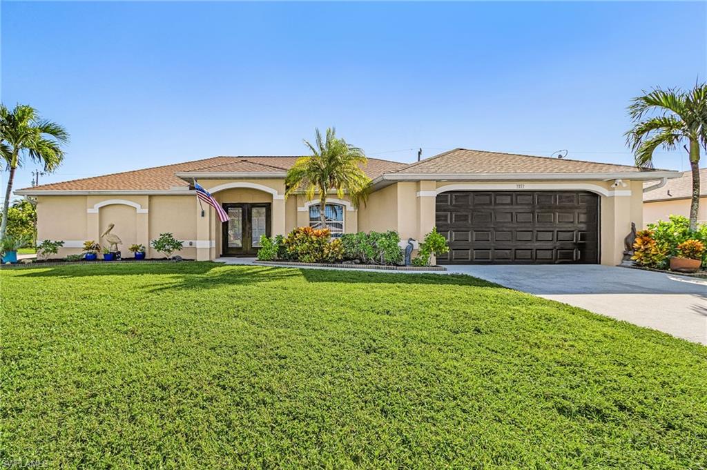 Escape to paradise in this spacious Cape Coral home located on a corner lot in the highly sought after area of SW Cape Coral. This home features 3 bedrooms, split floor plan with den and volume ceilings, New roof 2023, newer AC system, hot water heater and stainless-steel appliances. Plus, many more spectacular features for you to enjoy the Florida lifestyle. No water intrusion here. Large under covered screened in lanai with pool and pool bath directly off the lanai for your enjoyment. Come take a look and make this your dream home in sunny southwest Florida.