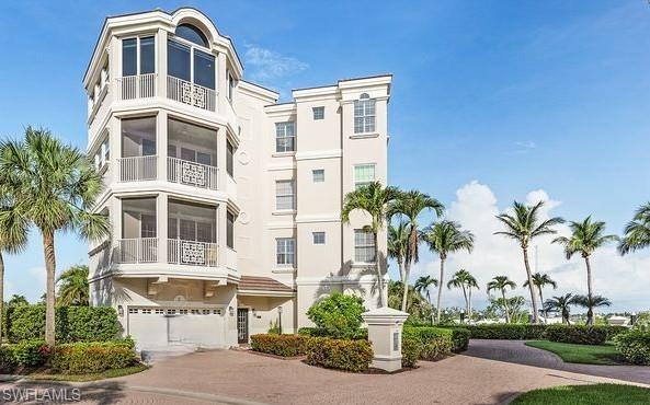 Harbour Landings Top Floor Riverfront Penthouse is Exquisite throughout with no expense spared. Country Club Sports Membership negotiable, assessment paid. Every Room is High Quality Custom Upgraded Professionally with a Clean Tasteful Elegant Feel. No Adjacent Building to the South and Waterfront West Views creates a One-of-a-Kind Light and Bright Atmosphere Throughout. Living-Dining Expanded into Lanai with Raised 24"x 24" Porcelain Flooring creating an extra 300 s.f. living space offering Spectacular Panoramic Marina and River Views, Retractable Screens and Sun Shades. Open Kitchen with White Custom Cabinetry, Quartzite Counters and Backsplash, Center Island, High Quality Appliances, Large Breakfast Nook and Wood Flooring. Family Room Expanded into Balcony with Unique Coffered Ceiling, Custom Cabinetry and Wood Flooring adjacent to Powder Room with Comfort Height Counters. Master Bedroom Suite is also Riverfront and Opens to Lanai, Custom Private Bath with Heated Porcelain Flooring, Free Standing Tub, Shower, Comfort Height Counters and Walkin Closet. Pocket Door installed creating a Second Bedroom Suite, Window Seat Tray Ceiling and Full Bath with Comfort Height Counters. Bedroom III-Den has French Doors, Wood Flooring, Custom Shelving and Storage Closets.  Huge 3+ car Garage with Cabinetry, Granite Counter, Sink, Whole House Water Softener and Epoxy Flooring. Elevator from guest lobby Opens Directly into unit with Glass Foyer Doors. Storm Rated Doors and Windows, Custom Solid Core interior Doors, Custom Baseboard, Plantation Shutters. Sonos Music System with Built-in Speakers Living Room, Family Room, Kitchen, Master Suite and Bedroom III-Den. Only 2 neighbors in building on Quiet Circle Drive. Staged Furniture-Furnishings could be purchased.