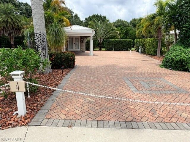 Welcome to Lot 4 at Cypress Trail RV Resort, a beautifully upgraded 35 x 90x corner lot offering exceptional outdoor space, privacy, and comfort in one of Fort Myers desirable RV communities.  This fully landscaped and irrigated lot is completely paved and features a supersized rear green space, creating a wonderful setting for relaxing, entertaining, or simply enjoying the beautiful Florida weather.  The property includes a 10 x 12’ finished shed with a toilet, sink, shower, ceiling fan, ample storage cabinets, vinyl flooring, and a mini-split A/C system, along with a 10 x 16’ roof extension that provides a comfortable covered porch area.  A large aluminum sink with a marble-type surface and an under-counter Frigidaire refrigerator add convenience for outdoor entertaining.  For added peace of mind, the lot also features three electric, remote controlled aluminum hurricane shutters, representing an investment of over $30,000.  Whether you’re looking for a winter retreat, a place to enjoy retirement, or simply your own piece of Southwest Florida paradise, Lot 4 offers the space, upgrades and low-maintenance outdoor living you’ve been looking for.
There are some amenities that Lot 4 has that can’t be appreciated until living there.
1. Privacy - you have your own oasis and don’t hear or see neighbors unless you want to invite them in :)
2. Accessibility - you don’t have to drive thru the park to get to your site. Easy In and Out.
3. Quiet - never hear pickleball or tiki events.
4. Shades - only ones in the park to have them. They offer privacy, wind, and weather protection, plus they make the roof overhand patio area a cozy room when the weather is cool.
5. Green space - the back yard is a person’s own dog park or playground for activities. This also is only offered for Lots 1 to 4.  Lots 5 and 6 do have easy access to this large green space.
6. Storage - we have added storage inside and out that is so helpful for RV life.
7. Decorative pots and plants - new last year at $1,000 each.
8. New Mini Split AC last year.
9. The roof of the extension is Brazilian Walnut - again, the only one that we know of in the park.
10. The neighbors are the greatest!
