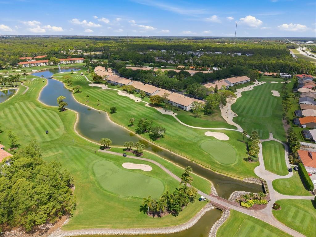 Enjoy scenic golf course living in this beautifully maintained residence located in Cranbrook Colony within Royal Wood Country Club in Naples. This desirable second-floor unit offers sweeping views of the 4th hole, providing a picturesque backdrop of lush fairways and tranquil surroundings from your private screened lanai--perfect for relaxing or entertaining. The thoughtfully designed floor plan features a bright and open living and dining area, complemented by a well-appointed kitchen with ample cabinetry and workspace. In addition to the bedrooms, a versatile study offers the flexibility to be used as a guest room, home office, or den. The primary suite provides a comfortable retreat with an en-suite bath and generous closet space, while guests will appreciate the privacy and convenience of the additional accommodations. As part of Royal Wood Country Club, residents enjoy bundled golf with immediate membership upon purchase, along with access to a full range of amenities including a challenging course, clubhouse, on-site restaurant, putting green, fitness center, yoga room, tennis, and a vibrant calendar of social activities, leagues, and events. Ideally located just minutes from downtown Naples, fine dining, shopping, and the Gulf's white-sand beaches, this property is perfect as a full-time residence, seasonal getaway, or investment opportunity.