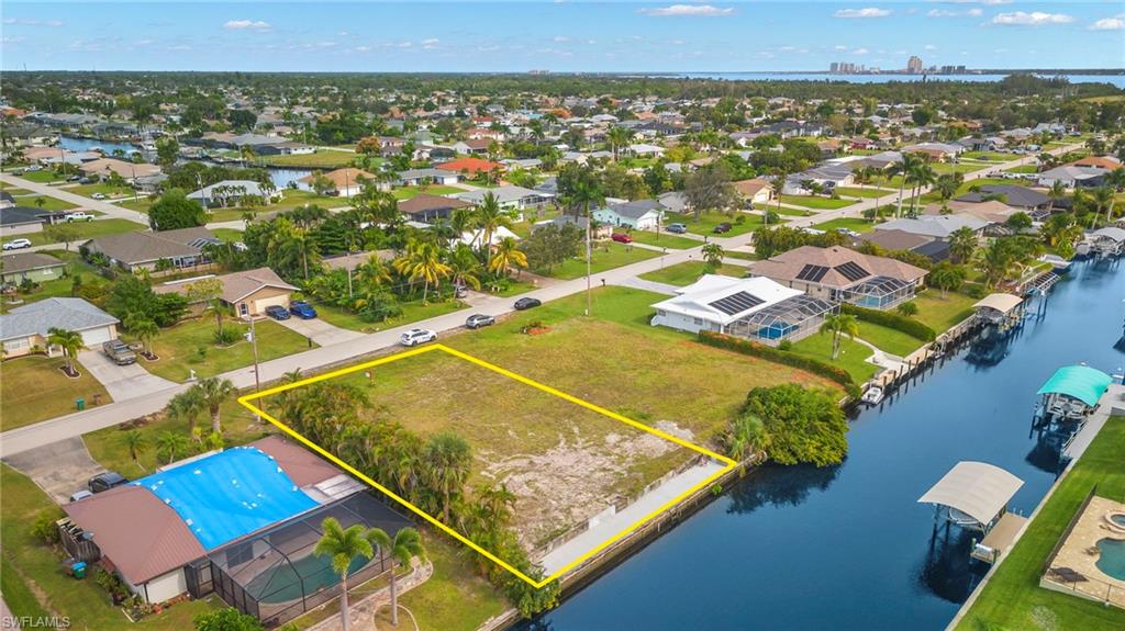 Southeast Cape Coral Gulf Access Lot With No Bridges and No Locks and no turns.

Bring your boat home.

This 80 by 130 foot waterfront lot in Southeast Cape Coral gives you Gulf access with no bridges, no turns and no locks between your backyard and the Caloosahatchee River.

The hardest part is already finished. A new seawall was completed in 2023, and you can tie your boat right up to it, so your time and budget can go into the house instead of the shoreline.

The lot has southern exposure, which means sunshine on the water and on your future lanai and pool for most of the day. Mornings with coffee by the water and evenings watching the sky change color over the canal come with the address.

Run out to the river for an afternoon of fishing. Cruise toward Sanibel for lunch. Keep going and you are on open Gulf water. With more than 400 miles of canals in Cape Coral, there is always somewhere new to explore by boat, kayak, or paddleboard.

On land, you are a few minutes from shopping, restaurants, and the Midpoint Bridge into Fort Myers, so everyday errands stay easy.

Gulf access lots this close to the river, with a new seawall already in place, do not come up often in this part of the Cape. Call today to walk the lot and talk through what you want to build.