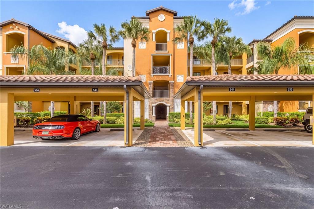 Welcome to Bonita National! This beautifully maintained FIRST-FLOOR condo includes FULL GOLF MEMBERSHIP, is available TURNKEY FURNISHED, and offers exceptional golf course views overlooking the first fairway!

With 2 bedrooms, 2 baths, and a split floor plan, this inviting home offers comfort, privacy, and everyday convenience. Welcoming furnishings make it easy to settle in, while the peaceful golf course setting provides a relaxing backdrop. Walk-in closets and generous storage throughout are complemented by a separate exterior storage room—perfect for beach accessories, bikes, coolers, and outdoor essentials. A dedicated covered carport space and ample guest parking add to the convenience.

Full golf membership is just the beginning of the Bonita National experience. Play a round on the Gordon Lewis-designed course, unwind beside the resort-style pool, or meet friends at the poolside bar and grill. Additional amenities include an onsite restaurant and bar, a well-equipped fitness center, eight tennis courts, and a full-service spa. Planned pickleball and bocce facilities will offer even more ways to stay active and connect with neighbors.

Beyond the community, enjoy convenient access to shopping, dining, Gulf beaches, and Southwest Florida International Airport, with the planned Midtown Bonita development adding to the area’s appeal. Whether you’re looking for a seasonal getaway or a year-round home, this first-floor retreat makes it easy to enjoy everything Bonita National has to offer.