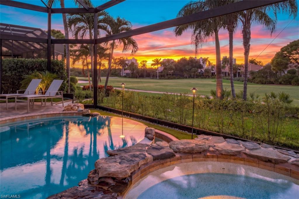 Unobstructed golf course views and picturesque sunsets set the scene for this beautifully updated detached villa in Augusta Creek at Bonita Bay. Featuring the sought-after single-story Birdie floor plan, this 3-bedroom-plus-den, 3-bath residence offers nearly 3,000 square feet of living space and an attached 2-car garage. Volume ceilings, elegant crown molding, a fireplace, and a dry bar create the perfect space for entertaining. The kitchen was remodeled in 2025, and showcases stainless steel appliances, quartz countertops, a built-in frame TV, and walk-in pantry. Outside, the completely redesigned lanai makes the most of the picturesque setting, with expansive picture screens (2025) framing the fairway beyond an infinity-edge pool, spa, and custom waterfall feature. A new summer kitchen (2026) creates an inviting spot for poolside dinners and relaxed evenings. Thoughtful improvements extend throughout the property, including a 2024 roof, fresh exterior paint (2026), interior paint in the main living areas (2024), updated landscaping and lighting, motorized hurricane screens on the lanai, and a 2026 generator with a 500-gallon propane tank. As a resident of Bonita Bay, you'll enjoy exclusive
access to a wealth of amenities including a private beach park, the popular Backwater Jack's Restaurant, and several community parks.
Riverwalk Park offers a kayak, canoe, and boat launch, along with pickleball and tennis courts for active living. For golf enthusiasts, there’s an
opportunity to join the Country Club, which boasts five championship golf courses, a sports/racquet center with a resort-style pool, and a state-of-the-art fitness facility, along with a luxury spa and salon. Don't miss the opportunity to own this piece of paradise in a premier community!