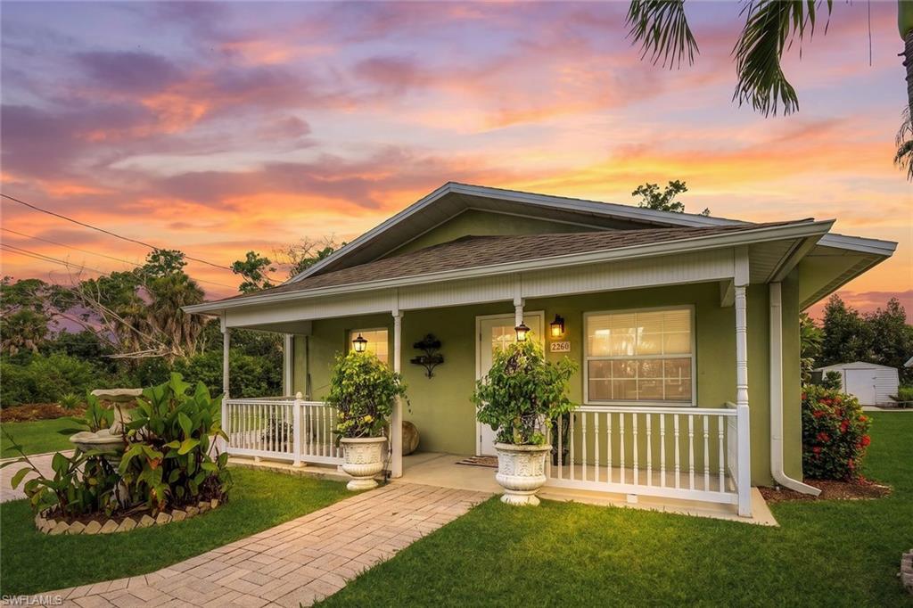 Move-in ready and meticulously maintained, this charming 2-bedroom, 2-bath home has been thoughtfully updated from top to bottom. Major-ticket improvements are already done for you, including a 4-year-old roof and 4-year-old HVAC system, providing peace of mind for years to come. Stainless steel appliances, tile flooring throughout, and fully paid-off solar panels add efficiency, style, and low-maintenance living. Additional upgrade in the kitchen and laundry are pull out cabinets perfect for organization and accessibility. 

A rare, fully permitted detached 2-car garage offers exceptional flexibility for extra storage, a workshop, or space for your hobbies, while the oversized driveway provides room to keep your boat right at home (boats allowed in the driveway). The fence was installed at a 1ft setback from the property line. The seller has a survey available. 
The real showstopper is the location. You're just steps from a public boat ramp, the lush Naples Botanical Garden, and the East Naples Community Park, home of the US Open Pickleball Championships. Settle into the vibrant Bayshore Arts District and enjoy the best of Naples living, with dining, shopping, art galleries, and pristine Gulf beaches all just minutes away.