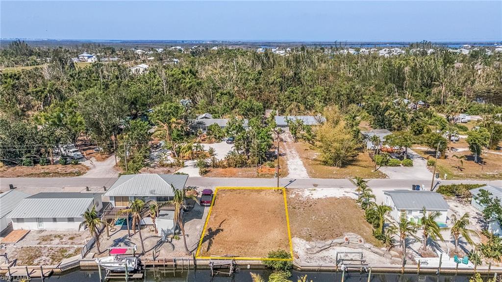 Cleared Waterfront lot with direct Gulf Access on the north end of Pine Island in Knights Bokeelia Isle. NO BRIDGES HERE. Minutes by boat to Charlotte Harbor and a short ride to the many places that the area offers like Matlacha Pass, Boca Grand Pass, the many Outer Islands and Beautiful Cayo Costa Beach. Close by are Boat Ramps, Restaurants and shopping.