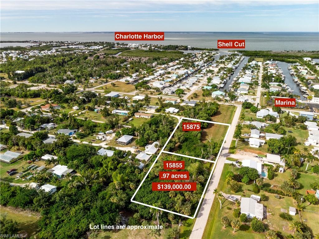 OPPORTUNITY KNOCKS: KNIGHTS BOKEELIA ISLE. RARELY AVAILABLE ON BEAUTIFUL BELLFLOWER STREET IN BOKEELIA, PINE ISLAND FLORIDA. 
 
WELCOME TO THIS OPPORTUNITY THAT IS PERFECTLY POSITIONED JUST YARDS FROM THE COMMUNITY BOAT RAMP/MARINA AND ONLY MINUTES FROM THE TAHITIAN VIBED BOKEELIA RIVIERA ON CHARLOTTE HARBOR.
 
WITH LIFE AMONG THE NATURAL WONDERS AND AMENITIES OF THIS SPECIAL ISLAND COMMUNITY, YOU POSITION YOURSELF ON ACREAGE, YARDS FROM DEEP WATER. MOST PROPERTY RIGHT ON THE CANALS ARE LIMITED IN SIZE. HERE YOU HAVE OPTIONS TO DESIGN YOUR FAMILY’S LEGACY COMPOUND AND RETREAT TO THE GOOD LIFE.YOU CAN  CREATE YOUR OWN MAGICAL, ENCHANTED FORREST AND TROPICAL GARDEN. ETC.. CITY WATER AND POWER AVAILABLE. IF YOU DIDN’T KNOW YOU WERE LOOKING FOR PINE ISLAND YOU’LL SOON KNOW… YOU ALWAYS WERE. 15875 BELLFOWER ST IS ALSO AVAILABLE.