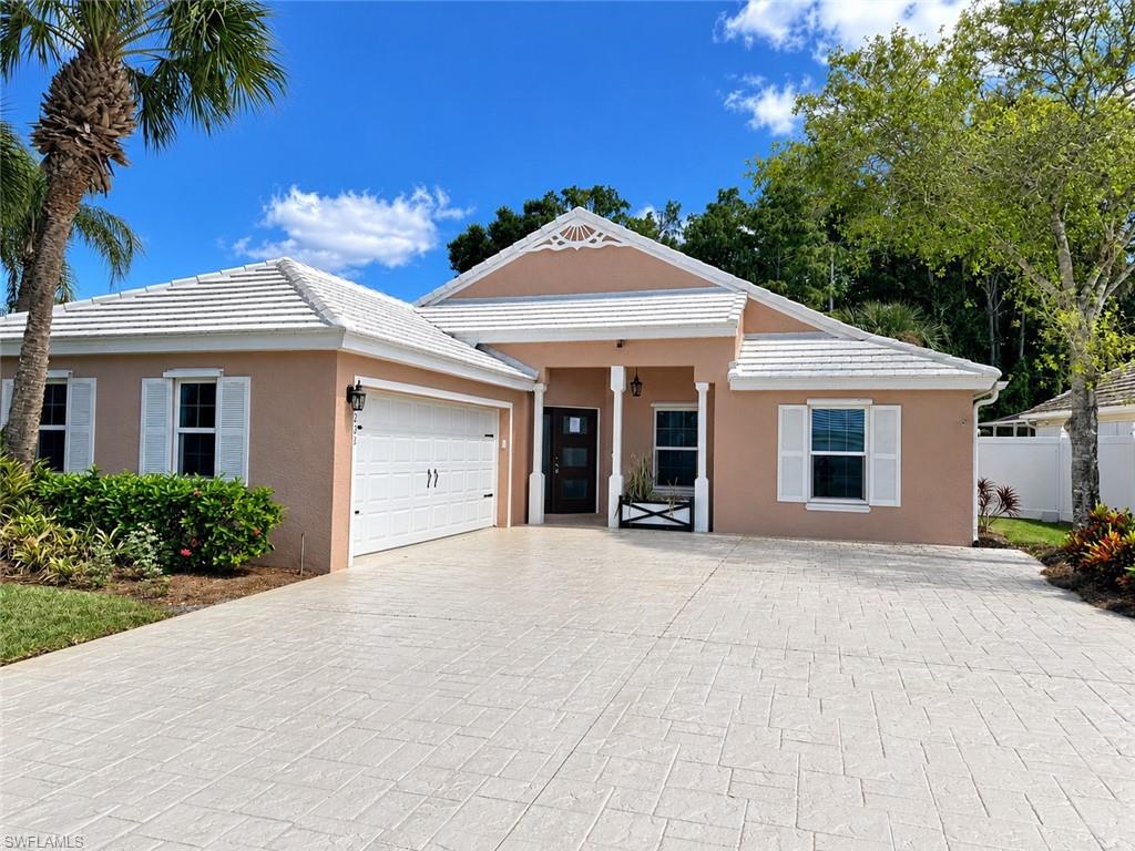 Welcome to Sterling Oaks, a gated community in desirable North Naples! This single-family home offers several recent updates, including an updated kitchen, wood-look laminate flooring throughout much of the home, an updated guest bathroom and an improved driveway. According to Collier County records, the roof was replaced in 2024. The home also features a Florida room located off the living room, providing additional space to relax and enjoy the peaceful surroundings. The attached two-car garage includes a mini-split air-conditioning unit for additional climate control. The rear of the property overlooks a natural preserve area, offering privacy with no homes directly behind the property. Sterling Oaks offers a variety of community amenities, including a clubhouse, resort-style pool, fitness center, tennis courts and more. Conveniently located approximately 5 to 7 miles from beautiful Bonita Beach, as well as shopping, dining, entertainment and everything North Naples has to offer. Enjoy the convenience of being just a short drive from the Gulf beaches while living in one of North Naples' established gated communities! Being sold AS IS, WHERE IS, Buyer is responsible for all inspections and certifications needed to close. All information & property details set forth in this listing, including all utilities & all room dimensions, are approximate, are deemed reliable but not guaranteed, & should be independently verified if any person intends to engage in a transaction based upon it. Seller/current owner does not represent and/or guarantee that all property information & details have been provided in this MLS listing.