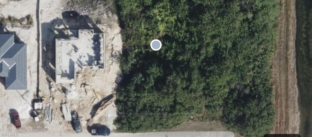 Buildable lot in Lehigh Acres FL! Next to new construction homes on paved road with electric at the curb. Excellent opportunity to build in a rapidly developing area. Buy today! Seller financing available! Hablo Español!