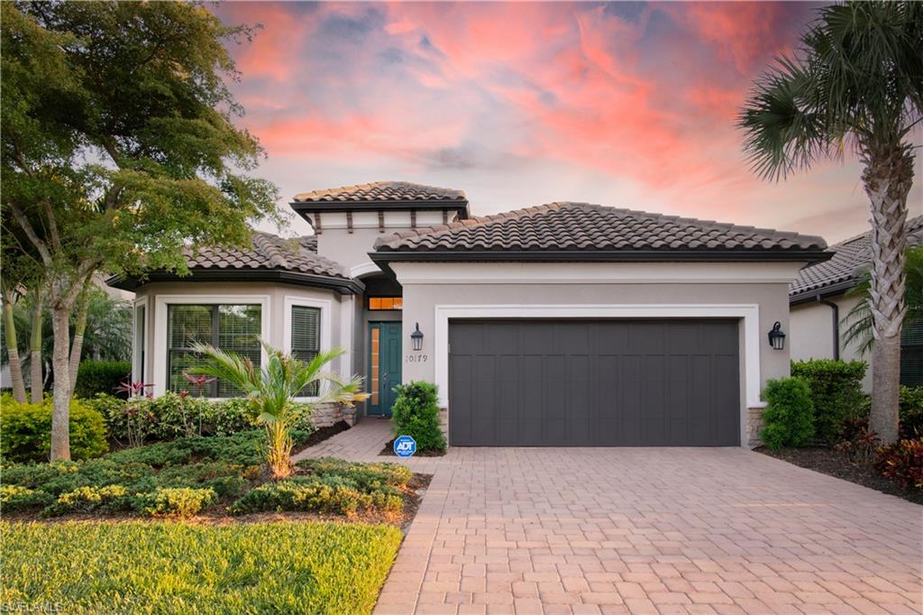 One of the quietest lots in Pebble Pointe with an expansive backyard. Meticulously maintained home with over $100k in builder and post closing upgrades (custom closets, custom entertainment center, upgraded level 5 cabinets, hardware, countertops, and upgraded shower enclosure, etc.). New carpet and lanai decorative flooring upgraded in 2020. The Piceno floor plan offers an abundance of natural light, and the large expansive kitchen/island flows beautifully into the family and dining area. Master and Guest Bedroom have bay windows which are welcomed by the FL Sunshine. 4-foot extended garage is the perfect area for additional storage. Dual master walk-in closets with custom cabinetry. Pebble Pointe is a quiet enclave of 90 single-family homes located less than two miles to US41, Lee Health New 2019 Hospital, Coconut Point, and minutes to SWFL's beaches/attractions, and RSW Airport.