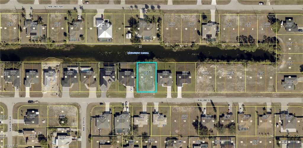 Discover the perfect opportunity to build your dream home on a street surrounded by beautiful new construction and impressive new homes. Ideally located just off Chiquita Boulevard near Pine Island Road, this property offers convenient access to a variety of restaurants, shopping, entertainment, and everyday amenities.  This is a freshwater canal lot, offering added flexibility when it comes to your waterfront design. Unlike saltwater canal properties, seawalls are not required on freshwater canals, giving you the option to explore attractive and potentially more natural shoreline alternatives, such as riprap. A thoughtfully designed shoreline alternative can create a littoral zone that enhances habitat for fish and wading birds while helping filter nutrients combining waterfront appeal with environmental benefits.  With new homes transforming the surrounding neighborhood and a convenient location close to major amenities, this lot is an excellent opportunity to create a custom waterfront home in a growing area.