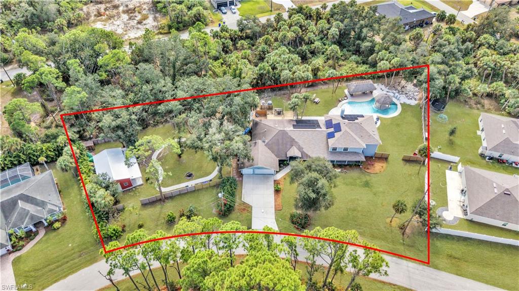 Multigenerational Home over 5500 sqft. back on the market with a NEW roof! This spacious home offers over 5,400 sq. ft. of living space with 6 bedrooms, 4 bathrooms, and multiple bonus rooms. A major renovation was completed in 2023, adding more than 2,000 sq. ft. to the home, creating a large pool and cabana area, and installing a new roof with many additional upgrades. From the moment you step onto the welcoming front porch spacious enough for rocking chairs to enjoy your morning coffee, you’ll feel the warmth and character of this exceptional property. Inside, the home features open ceilings and skylights that bring in natural light highlighting its modern, distinctive design. Multiple living spaces offer unmatched versatility, including a cozy family room including over 20-foot ceilings, a comfortable living room, a bright sitting room, and a formal dining room perfect for gatherings. The expansive kitchen is a chef’s delight, featuring abundant cabinet storage, granite countertops, two refrigerators, a generous center island, providing plenty of workspace for cooking and gatherings. Convenient access to one of the home's two laundry areas is located just off the kitchen. The first-floor master suite offers privacy and generous space, along with a walk-in closet. The second-floor master suite is located off a large loft area and includes its own private bathroom with an enclosed stone tub, a separate walk-in shower, a second laundry area, and a custom large master closet. Enjoy Florida living at its finest with a sparkling large swimming pool, complete with an beach style “island” cabana perfect for lounging or entertaining. The fenced backyard is designed for outdoor enjoyment and a playground area, and a concrete path suitable for bicycles, rollerblades, and other activities. A metal barn/shed was also added in 2024 for additional storage or workspace and is 36'x40'. Located minutes from Wellen Park and CoolToday Park, the home offers quick access to dining, recreation, and community events. I-75 and local Gulf Coast beaches are a short drive away, making this a convenient location for travel, work, and leisure. Schedule your own personal tour today!