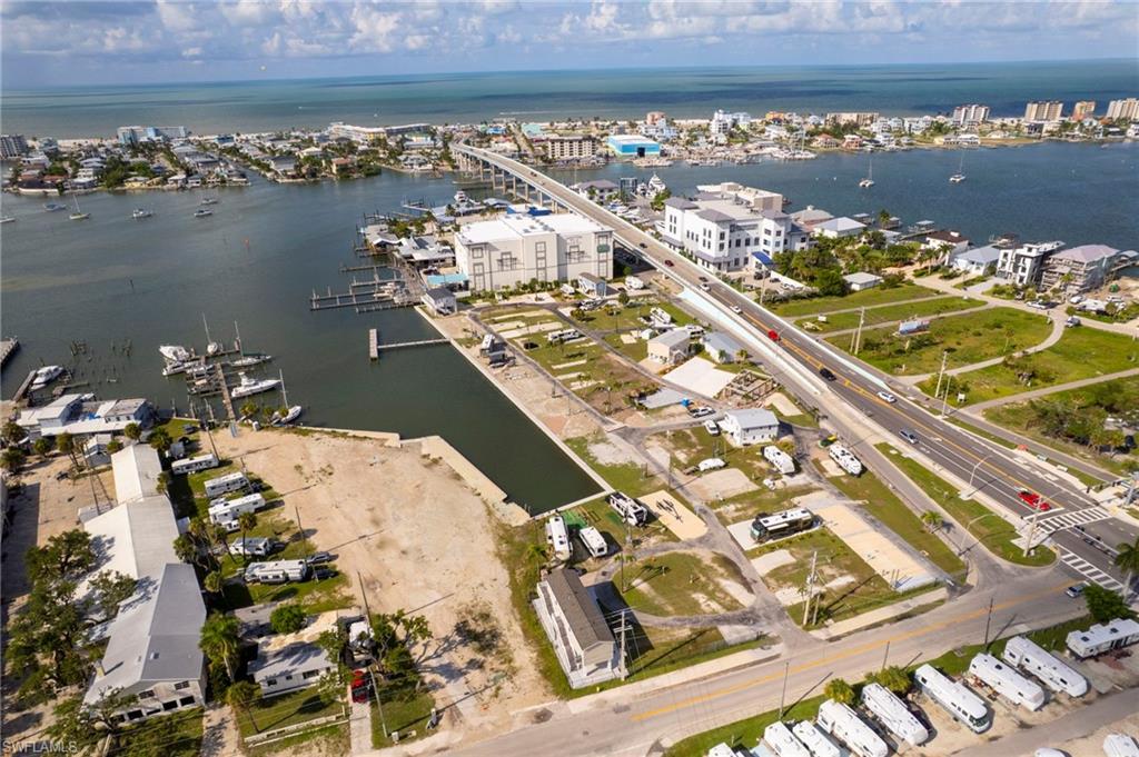 STRAP number is : 24-46-23-L2-35000.0460
Enjoy the Southwest Florida lifestyle from this homesite in Gulf Cove, a 55+ waterfront co-op community located just across the bridge from Fort Myers Beach on San Carlos Island. Gulf Cove offers quick Gulf access and an outstanding location convenient to the beach, boating, restaurants, shopping, and everything Fort Myers Beach has to offer. Ownership includes a 1/60th interest in the community, with low HOA fees of just $800 per quarter. The community has completed sewer, water, and electric improvements. Highway-ready RVs are permitted on the lot through October 2027, providing additional flexibility while planning for a future home. New homes must be constructed in accordance with current FEMA requirements. Whether you're looking for a seasonal getaway or a place to build your future Florida home, Gulf Cove offers a unique opportunity to enjoy waterfront living just minutes from Fort Myers Beach.