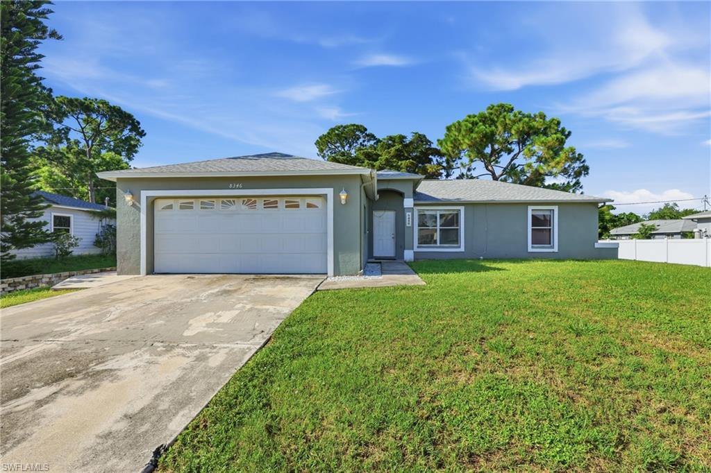 Welcome to this spacious concrete block 3 bedroom, 2 bathroom home in the heart of San Carlos Park, offering the freedom of NO HOA and a brand new roof installed in December 2024. This home features an open-concept layout with vaulted ceilings, abundant natural light, and tile flooring throughout the main living areas, creating a bright and inviting atmosphere. The kitchen offers ample cabinet and countertop space, a pantry, and newer microwave and range, while overlooking the living and dining areas, making it ideal for everyday living and entertaining. The spacious primary suite features a walk-in closet and an en suite bathroom with dual vanities, while two additional bedrooms and a full guest bathroom provide comfortable accommodations for family and guests. Step outside to enjoy the spacious backyard with plenty of room to entertain, garden, or create your own outdoor retreat. Conveniently located just minutes from shopping, dining, Gulf Coast Town Center, FGCU, RSW International Airport, I-75, and Southwest Florida’s beautiful beaches, this home offers an outstanding combination of comfort, convenience, and value. Whether you’re a first-time homebuyer, investor, or seasonal resident, this is an opportunity you won’t want to miss.