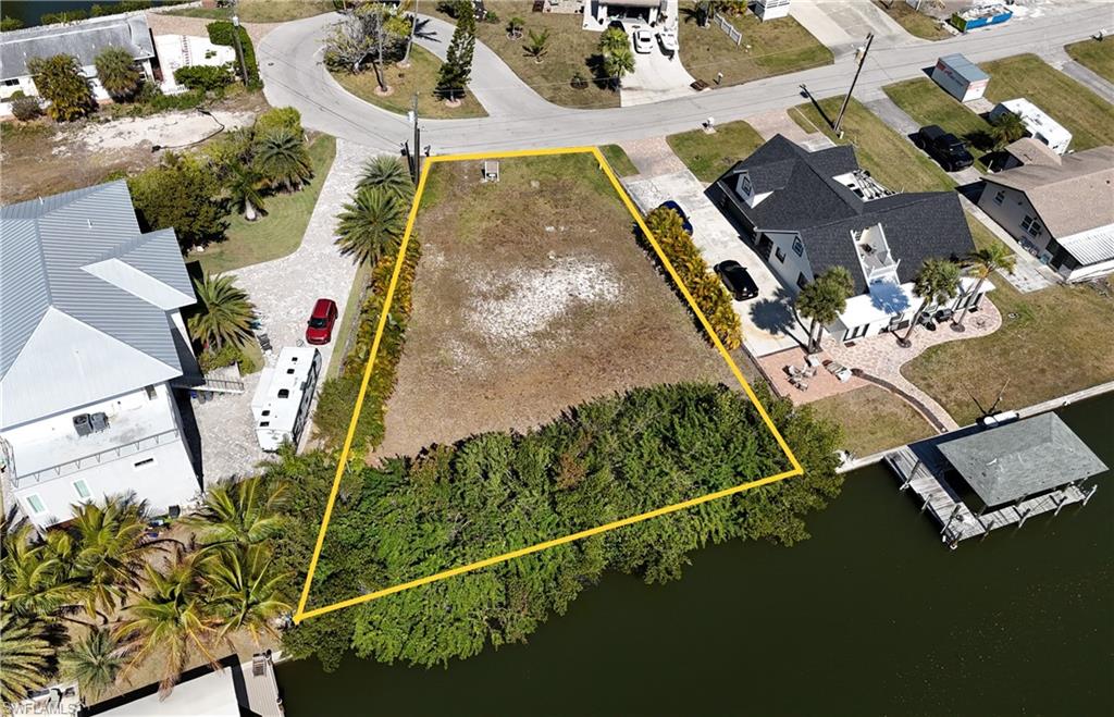 Gulf-Access Waterfront Lot | Bonita Springs | $699,000

A compelling opportunity to secure a Gulf-access waterfront lot in one of Bonita Springs' most sought-after corridors. Whether you're a homeowner ready to build your dream home or an investor looking to maximize a rare waterfront parcel, this lot delivers something almost impossible to find — a clear path to breaking ground from day one.

 

The Hard Work Is Already Done
The current owner has invested over $45,000 in pre-development work and site preparation — including demolition of the prior structure — so you don't have to. This lot conveys with a complete pre-development engineering package including geotechnical and foundation engineering, state-approved FDEP seawall and boat lift exemption, P.E.-sealed dock and seawall construction plans ready for permit submittal, and a fully completed wetlands mitigation assessment with Army Corps permit application ready to file. You're already there.

 

Rare Zoning Flexibility — Single Family or Duplex
This parcel supports multiple configurations, including duplex/townhome development — an uncommon opportunity in this waterfront market that opens the door for investors and developers as well as end users.

Available build configurations:

Single Family — 4 Bed / 4.5 Bath / 4-Car Garage — 3,084 sq ft under air
Single Family — 4 Bed / 4.5 Bath / 3-Car Garage — 3,014 sq ft under air
Duplex Townhome (3-Story) — 3 Bed / 4 Bath + 2 Half Baths / 2-Car Garage — 3,036 sq ft under air per side
 
Build With Monarch or Bring Your Own Vision
Monarch Builders — a Southwest Florida custom home builder with 25+ years of experience — is available to build from one of these plans or design something entirely custom through their in-house design team. Or bring your own builder. The lot and the engineering stand on their own.

Contact listing agent for the complete engineering package.