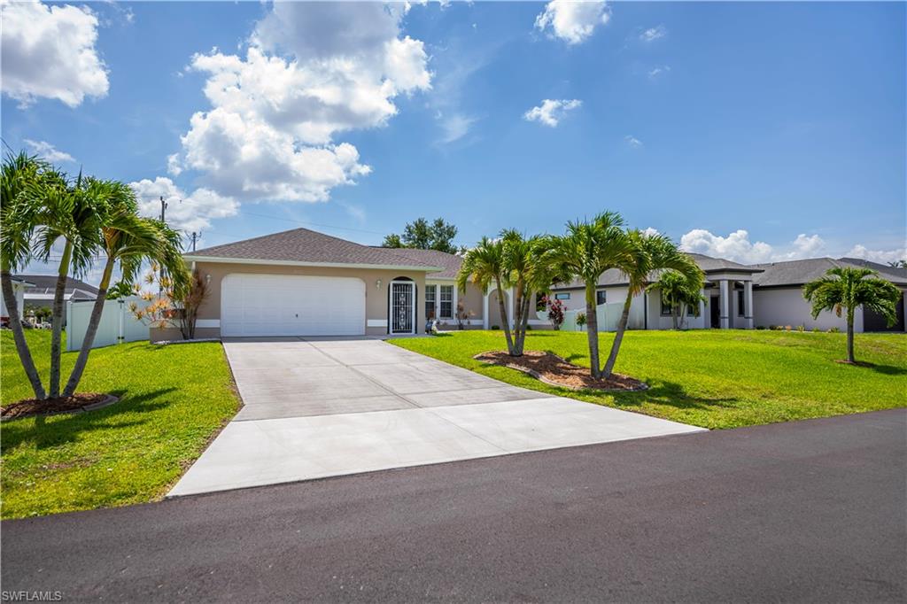 MOVE IN READY home with a FENCED yard and upgraded ROOF (2022) on CITY WATER and sewer and in a NO FLOOD zone! This very well maintained property has a spacious backyard and shed.  It features open concept living with a vaulted ceiling and tile floors throughout. The kitchen has granite counters with newer SS appliances   
The split bedroom floor plan offers privacy with the primary able to fit a king bed- the attached private bath has new shower doors.  The laundry room has a GE washer and dryer and upper cabinets for storage. The garage has Epoxy floors for durability and the water heater is only 6 months old plus the newer roof has a transferable 30 year warranty!  With hurricane shutters and a generator hook up you will have peace of mind. 
Situated on a quiet street conveniently close to shopping, dining, and schools. This the perfect home for a first time buyer or a retiring couple!