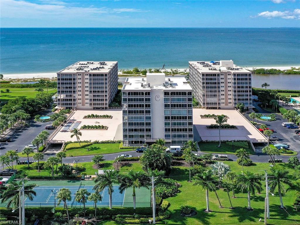 Where memories are made. Creciente has always been one of the most desirable complexes on the island. After damage left by Hurricane Ian, the unit has been gutted and is a blank slate ready for new memories to be made. As we look toward the future, you can see what this home can be transformed into again. Patience and vision are reflected in the listing price. This easy living lifestyle offers plenty of space. Corner residence right on the Gulf of Mexico where you can enjoy gorgeous sunsets and sugar soft sand. Quick access to the outdoors - no need of an elevator with this direct access unit - it's like a beach house without the maintenance! Under building parking space included. Highly desired location right across from the shopping center of Santini Marina Plaza. Complex offers a large pool, tennis court, exercise room, and weekly activities during season. You'll already notice Fort Myers Beach coming back to life with many shops and restaurants reopened or currently being rebuilt. Come be part of our story! No car needed - you can walk to shops and restaurants or simply stroll on the beach daily.