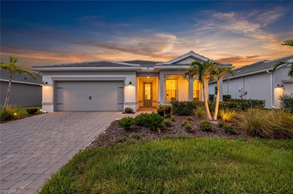 This 2,056 sq ft home in Terra Walk sits in one of Babcock Ranch's most in-demand pockets, and it's been upgraded past standard builder grade. Three bedrooms, a den you can actually use as an office (glass French doors keep it bright but separate), 2 bathrooms, and a 2-car garage with 220 amp EV charging already installed.
The great room is the real draw. Zero-corner sliders push the whole wall open to the lanai, so on a nice day the inside and outside just become one space. There's a trim accent wall back there that gives the room some character instead of feeling like every other great room on the block.
The primary suite has a frameless glass shower, which gives it a spa like feel. It feels bigger and cleaner than a framed one. Laundry room is oversized with real storage, not an afterthought closet. And the little things add up: custom window treatments, upgraded lighting, and ceiling fans in every room, the kind of stuff most buyers end up adding themselves after closing, already done here.
Then there's the location. This home sits just seconds off State Road 31, so getting in and out of the neighborhood for work, errands, or a day trip doesn't eat up your morning. Terra Walk's gated entrance opens to an 8-acre lakeside amenity campus anchored by a 19,000 sq ft clubhouse with a fitness center, golf simulator, card rooms, and The Porch Bar & Grille for poolside dining. Outside there's a resort-style pool and spa, pickleball, tennis, bocce, a fire pit lounge, and a dog park, all connected by walking trails along the lakes. It's a quick trip to Founder's Square for restaurants and live music, and just 1.5 miles to Publix and the Shoppes at Yellow Pine. All of it inside Babcock Ranch, America's first solar-powered town.
This one's move-in ready, worth seeing in person.