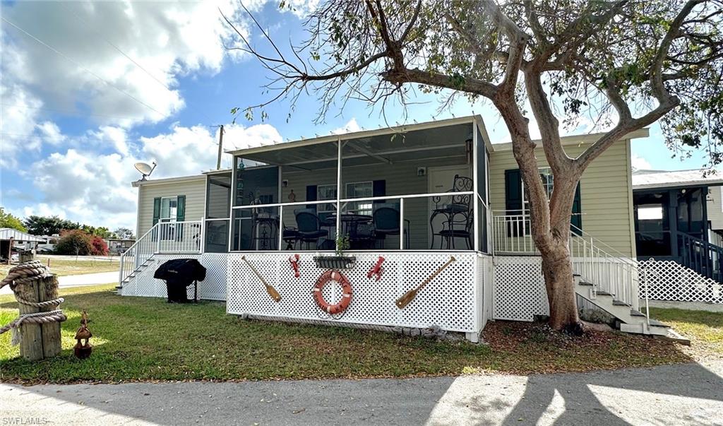 Chokoloskee Island home, deeded dock, direct access on Gulf.
Here's a rare opportunity to own on Chokoloskee Island outside of Everglades City in Parkway Village where you can live at the edge of the Gulf of America & have your boat at your deeded dock. Direct access to the 10,000 Islands and exceptional fishing. Quaint community offers the convenience of a small Mariana, gas station, boat launch, fish cleaning station, live bait, a store & a small communal clubhouse. This  (2006) 2 Bed 1 bath home resides on its own lot so there is no lot rent. Only a small quarterly assoc. fee of $620 which covers these amenities plus lawn care & trash. This home ready for its new owner & furnished. Updates include a wonderful, newer, relaxing screened lanai. Corner lot with dual views of the ocean to be enjoyed. All appliances including washer & dryer. Newer air handler & ac. Make this your perfect getaway today. Golf cart for purchase separately upon an acceptable offer. Buyer to verify all information, provided for reference only.