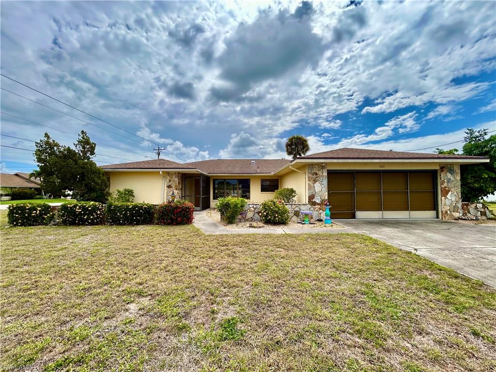 This is a HUD bank foreclosure #095-028539, located at 3419 SE 5th Ave in Cape Coral.  This home is larger than most homes in the area and offer a formal living room, dining room, and family room.  The Primary bedroom is split and separate from the guest bedrooms and baths.  The kitchen is large with a pantry and room for a table.  It is open to the family room with a vaulted ceiling, fireplace with built ins, and sliders that lead to the screened lanai.  Room for a pool is possible and has a pool bath option. The 2 car garage has a laundry tub, built ins, and a service door.  This home is sold as-is.