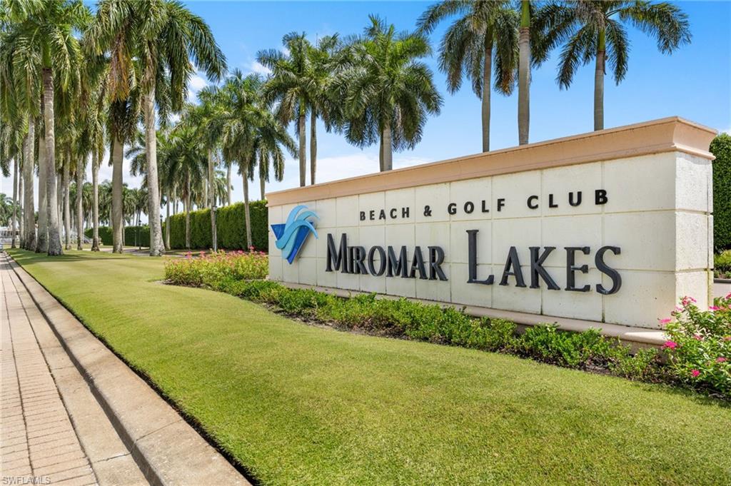 Experience exquisite resort living inside the gates of Miromar Lakes Beach & Golf Community in this beautifully furnished 2 BR/2 BA + Den Coach Home with an attached 2-car garage. Discover the perfect blend of comfort and coastal in this tastefully furnished unit designed with an open floor plan ideal for entertaining. The main living area flows seamlessly to the screened lanai, where tranquil water views create a peaceful backdrop for everyday living! This coach home offers a light and airy ambiance with thoughtful design elements that enhance both functionality and relaxation - an inviting retreat where serenity meets modern Florida living. Stress-free living with hurricane resistant windows and electric hurricane shutters on the lanai. Not in a flood zone. Plantation shutters throughout. Newer SS appliances and A/C unit. Laundry room with front-load washer & dryer and utility sink. Miromar Lakes is truly unique with its concierge services, fitness center, full-service salon & spa, resort community pool with food & beverage service, lighted Har-Tru tennis courts, pickle ball, bocce, volleyball, 3 miles of white sandy beaches, & a Marina with boat rentals.  Experience the beautiful Beach Club & Blue Water Grille for your dining pleasure.  Enjoy 700 acres of freshwater lakes for boating, fishing, & water skiing. Golf Memberships are available for the 72-par championship golf course designed by Arthur Hills. Close to RSW Int’l Airport, shopping and restaurants.