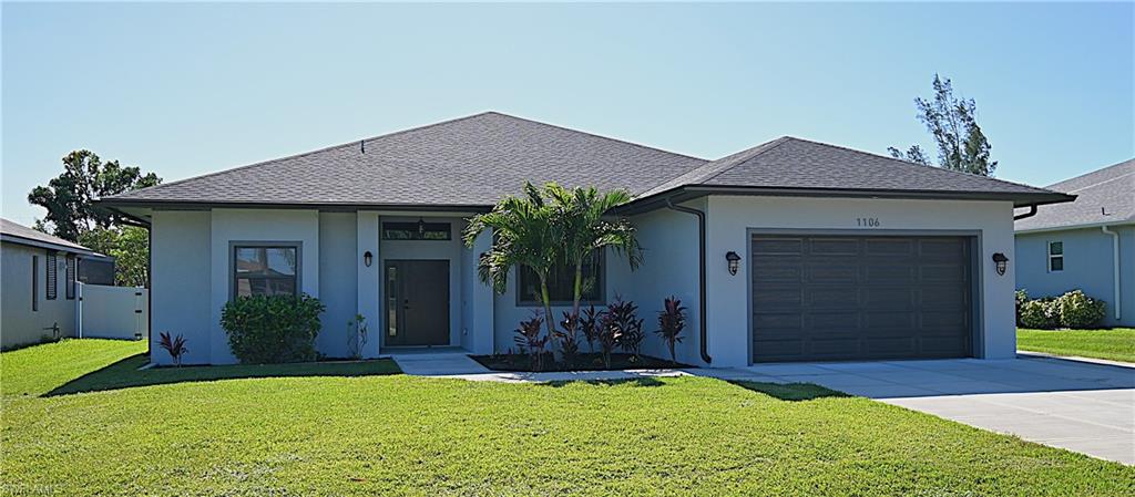 Fantastic turnkey south exposure canal home in the Southwest of Cape Coral in a no flood Zone (X) - no hurricane damage! This 2,370 sq ft home built in 2021 is a solid concrete home with 3 bedrooms and 2 1/2 bathrooms and is tastefully furnished with. The room between garage and kitchen does not only comfortably accommodate the air handler, washer and dryer, the tankless water heater and the water filtration system but also serves as a hurricane safe room and as additional storage space; this room is all concrete with impact and lockable doors. Impact windows, doors and garage door, which is also remotely controllable. The huge entrance area gives direct access to the dining area, kitchen, living area and primary bedroom. The modern kitchen with lots of upper and lower cabinets as well as a spacious pantry also offers high end appliances, of which the cooktop as well as the water heater is served by a 420 gallon gas tank installed at the side of the house. The sink features a second faucet with additionally filtrated water to prepare your foods. The big living room has lots of natural light with a view across the canal and plenty of seating opportunities as well as a 82" TV. The primary bedroom has direct access to the spacious lanai through french doors. The primary bathroom features double vanities, a tub and a separate shower tiled up to the ceiling. The outside area is all enclosed by big screen windows and offers a great spot to hang out and entertain at the lounge area and BBQ or enjoy the view across the water from the heated whirlpool. The half bathroom is accessible from the inside and outside. Located in a great and well maintained neighborhood consisting of fire chief, police officer, member of coast guard etc.