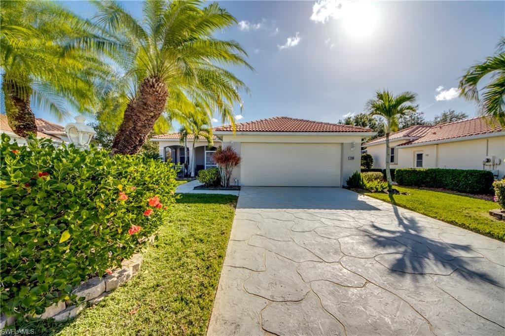 Beautiful home with a water and golf course view.  All tile, two bedrooms located on separate sides of home with a den and 2 full bathrooms.  All new appliances in the kitchen, with a breakfast bar and stools and eat in kitchen area.  This community has every amenity you could imagine; Restaurant, Bar, Fitness Center, Ballroom, Golf Course, Pickleball, Tennis, Bocce, Corn hole, Shuffleboard and Billiard Room.  ROOF HAS BEEN REPAIRED 8/26 AND WARRANTED FOR 2 YEARS.