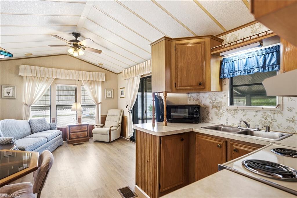 Welcome to easy Southwest Florida living in Limetree Park! This well-maintained, land-owned manufactured home is located in one of Bonita Springs' most desirable gated 55+ communities. Offering 1 bedroom and 1.5 baths, this home is the perfect seasonal getaway or year-round residence.

Step inside to find a bright and inviting interior, then relax in the spacious screened-in Florida room that provides additional living and entertaining space. Whether you're enjoying your morning coffee, hosting friends, or unwinding after a day at the beach, this versatile space is sure to become your favorite spot.

The home features low-maintenance landscaping, and is just a short stroll from the community amenities. Limetree Park offers a heated pool, clubhouse, shuffleboard, bocce, and a full calendar of social activities in a friendly, active neighborhood. The community is land-owned, gated, and ideally located just minutes from Bonita Beach, Coconut Point, shopping, dining, and Southwest Florida's best attractions.

Don't miss this affordable opportunity to enjoy the Florida lifestyle in a welcoming, active adult community!