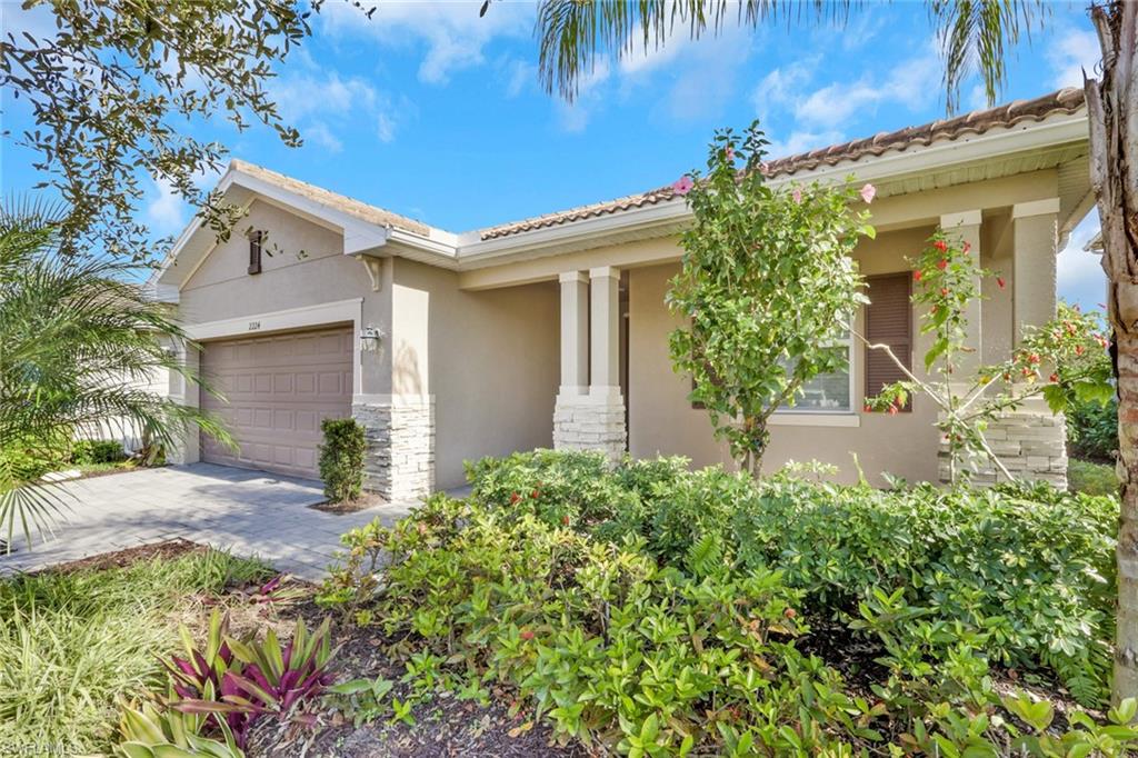 Welcome to this beautifully maintained 3-bedroom, 3-bathroom home in the highly sought-after gated community of Orange Blossom Ranch. This spacious residence offers an open-concept layout filled with natural light, featuring a modern kitchen with stainless steel appliances, a large island, and plenty of storage—perfect for entertaining. The primary suite provides a peaceful retreat with two generous walk-in closets and an en-suite bathroom with dual vanities and private toilet. The first guest room features an en-suite bathroom, providing privacy and comfort for your guests. The second guest room is tucked away with a hallway bathroom, allowing for optional private or shared usage. Storage abounds in this home, with hall closets, linen closets and ample garage. Outside, enjoy a screened lanai overlooking a private backyard, ideal for relaxing or hosting guests (plenty of room for a pool!). Residents of Orange Blossom Ranch enjoy resort-style amenities including pools, fitness center, playgrounds, sports courts, and scenic walking paths—all just minutes from top-rated schools, shopping, and Naples’ beautiful Gulf beaches. This home is move-in ready and waiting for you to make it your own.