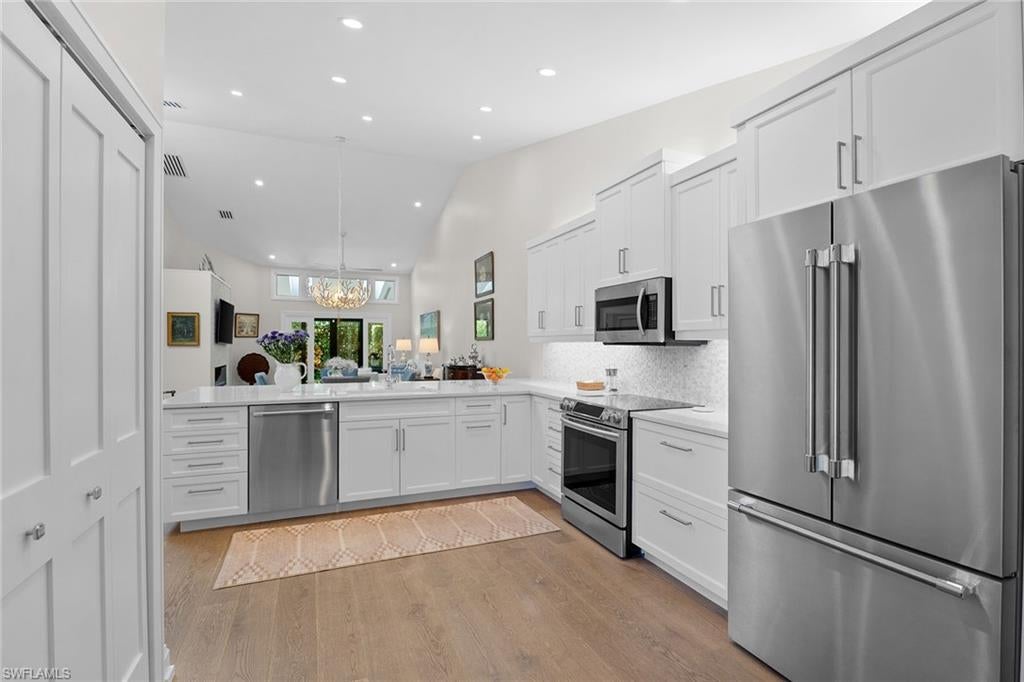 VILLAS AT PELICAN BAY - Residential