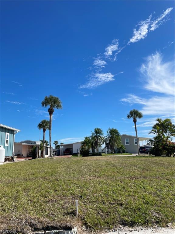 Build your dream home or investment property on this beautiful canal-front lot located in the desirable Bayside Estates, a welcoming 55+ community just 2.5 miles from Fort Myers Beach. Enjoy the best of Florida living with direct canal access to the Gulf—perfect for boating enthusiasts—and the option to bike to the beach, restaurants, and local attractions to experience the relaxed Fort Myers Beach lifestyle. Bayside Estates offers low HOA fees and a variety of resort-style amenities, including a heated community pool, tennis and bocce courts, clubhouse, and year-round social events. Conveniently situated near shopping, dining, and marinas, this property offers both comfort and convenience in a vibrant waterfront setting. Don’t miss this opportunity to create your own slice of paradise in one of Southwest Florida’s most sought-after 55+ communities.