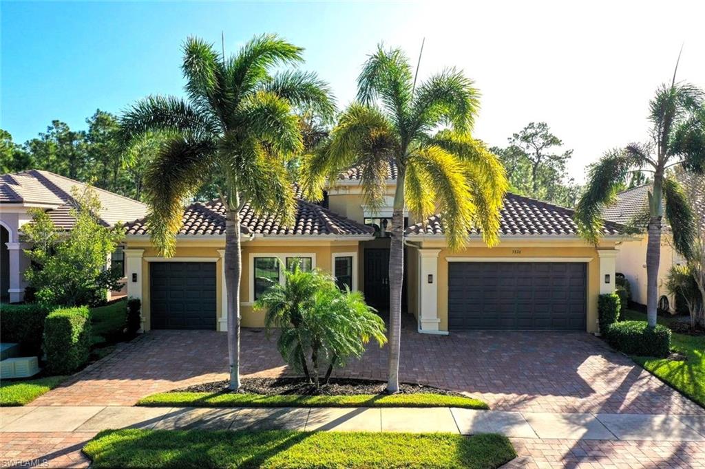 One or more photo(s) has been virtually staged, AI generated or rendered.  SPACE, CONVENIENCE & RESORT-STYLE LIVING IN RIVERSTONE! Discover an exceptional opportunity in one of North Naples' most desirable gated communities! Ideally situated just one house and a street away from Riverstone's spectacular clubhouse, with the neighborhood school bus pickup approximately a 2–3-minute walk from your front door, this spacious single-story Drake model offers an outstanding combination of location, comfort and versatility. Offering 3,376 square feet under air, 4 bedrooms plus a den, 4 full bathrooms and a 3-car garage, this thoughtfully designed residence welcomes you with an attractive circular driveway, adding curb appeal and convenient additional parking. Inside, the desirable split-bedroom floor plan features generous spaces for gathering, entertaining and everyday living. Separate formal living and dining rooms provide wonderful flexibility, while the spacious kitchen features granite countertops, stainless steel appliances, a center island and pantry, opening to an inviting family room and casual dining area. Tray ceilings, crown molding, tile and wood flooring add architectural character throughout. The private primary suite features dual vanities, a soaking tub and separate shower. Step outside to the screened lanai overlooking a peaceful wooded preserve, offering privacy and PLENTY OF ROOM FOR A CUSTOM SWIMMING POOL! A professionally prepared conceptual pool rendering is included in the listing photographs, helping buyers visualize the possibilities of creating their own backyard oasis. Pool design and installation are subject to applicable approvals. Riverstone residents enjoy an impressive array of resort-style amenities, including a resort pool, lap pool, children's splash area, playground, tennis, pickleball, basketball, fitness center, clubhouse and a variety of community activities. Conveniently located near shopping, dining, schools, beaches and everything North Naples has to offer. GENEROUS SINGLE-STORY LIVING, PRESERVE PRIVACY AND AN EXCEPTIONAL LOCATION WITHIN RIVERSTONE! Whether enjoying the neighborhood amenities or relaxing at home, this property offers the space, flexibility and opportunity to create the Florida lifestyle you've been looking for. Schedule your private showing today!