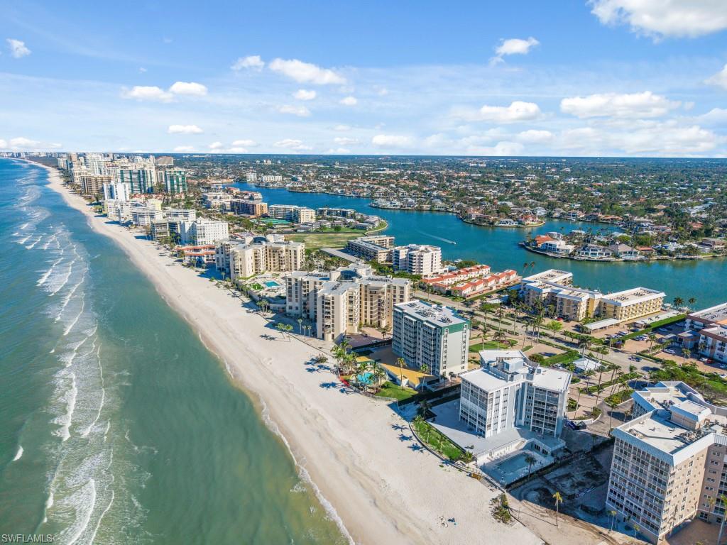 This an exceptional price for  a second floor condo with beautiful views from the lanai and the balconies off the bedrooms overlooking Moorings Bay. This small complex is on Gulf Shore Boulevard North and it sits on Moorings Bay with The Gulf right across the street.You could move in this season if you like or these units are highly sought after for rentals. You can walk across the street to The Gulf or just a short walk to Venetian Village for shopping and dining.There are boat slips available to unit owners a fishing pier, kayak and paddle board launch, chickee hut, beautiful pool, sitting area to watch the sunrise and sunsets on site management and more. This is the kind of vacation spot that people think of when they think about staying in Naples.