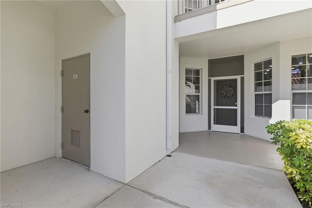 Located within Vanderbilt Country Club, this beautifully renovated first-floor condominium is truly move-in ready and thoughtfully upgraded from top to bottom. The kitchen has been completely redesigned with crisp white cabinetry that extends for generous storage and includes a built-in office/workspace area. Quartz countertops, a glass tile backsplash, and Samsung stainless steel appliances (approximately two years old) create a clean, modern aesthetic that is both functional and stylish. Throughout the home, you’ll find new blinds, LED lighting, updated ceiling fans, and a Maytag washer and dryer. The entire condo was freshly painted in neutral tones in 2024, providing a bright, cohesive look. Luxury vinyl flooring runs through the main living areas and primary bedroom, with porcelain tile flooring in both bathrooms for durability and elegance. Both bathrooms have been fully updated with solid wood vanities, modern mirrors, and wall cabinets, while the primary bath features a new glass shower enclosure that completes the spa-like feel. With every upgrade already completed, there is truly nothing left to do but move in and enjoy the Vanderbilt Lifestyle.
