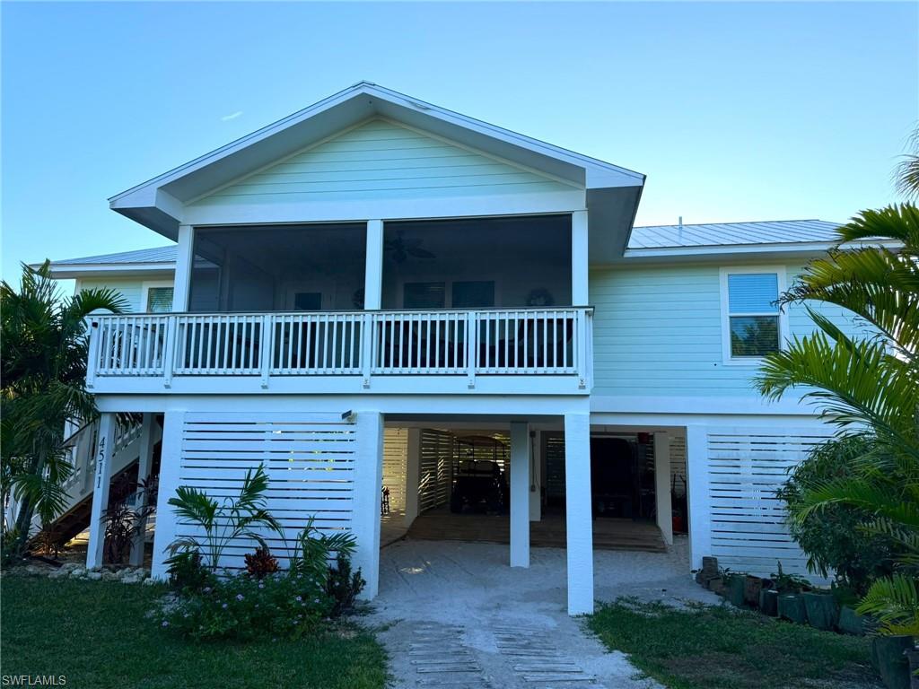 A Must See! Priced to Move! North Captiva Island FABULOUS Young Island Pool Home! Beautiful Coastal Turnkey Furnished Three Bedroom, Two Full Baths, Single Family Stilt, 2021 Year Built on a Private AND Oversized HALF ACRE - Corner Lot! FANTASTIC On Island Location! Close to the Beach and Seconds to The Island Club at North Captiva its’ Marina, Mangos Restaurant and Bar, Mangos Convenience Store, and the Boats and Fun Island Store. Bright, Open, Great Room Floor Plan. Split Bedroom Floor Plan. Lovely Kitchen with Large Center Island with Breakfast Bar. Great Sized Bedrooms and Upgraded Full Baths. Wonderful Front Screened Balcony and Large Back Open Balcony Overlooking the Inground Pool and Grounds. Other Features and Upgrades Include: Ideal Newer Construction, Impact Resistant Windows and Doors, Hardie Board Siding, New Whirlpool Appliances, Granite Countertops, Dual Sinks in Both Baths, Upgraded Tile Bath Walls, Convenient Laundry Room with Washer and Dryer, Luxury Tile Plank Flooring Throughout, Vaulted Ceilings, Metal Roof, Two Covered Carport Area(s), Large, Heated, Salt Water Pool, Outdoor Summer Kitchen, Entry Gate PLUS a Gorgeous, Fenced Yard - A Lush Tropical Oasis with Mature Assorted Palms and including Five Coconut Palms. Turnkey Furnished and Ready for Rentals Should you Wish for Rental Income Too with Professional Licensed Mgmt. Special Note: A Boat Slip with Covered Boat Lift is also Offered for Sale in Addition to this Home Sale at $235K. It Accommodates up to 26’Boat and 10Klbs. Please Inquire with Agents! Paradise Awaits! Now is the Time to Make “Hidden Garden” your Island Dream Home and/or Investment Opportunity! Schedule Your Showing Today! NEWEST HOME AT THIS PRICE POINT!