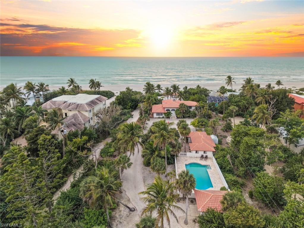 Positioned and priced primarily for its underlying land value, the gulf front property presents a compelling opportunity for builders, developers, and discerning buyers seeking to create a custom Gulf front residence, multigenerational compound, or thoughtfully designed redevelopment project. Existing improvements include a three bedroom, three bath main residence, separate two bedroom guest home, private pool, detached garage, beachside cabana, and screened gazebo, providing additional flexibility for restoration or future development.

A rare opportunity to create an extraordinary gulf front legacy estate on Captiva Island. Offering approximately 100 feet of direct Gulf frontage, this exceptional estate parcel combines coveted beachfront acreage with established multifamily zoning and estate entitlement, a distinctive combination increasingly difficult to replicate under today's coastal development regulations.

The property's established zoning distinguish it from conventional beachfront offerings, presenting possibilities for an exceptional coastal vision while complementing the low density character of prestigious Captiva Drive. Adding further value is a grandfathered shared bayside bulkhead providing access to Captiva's boating waters.

Opportunities combining substantial Gulf frontage, beachfront acreage, and distinctive development entitlements are exceedingly limited. Surrounded by some of Captiva's most notable estates, this extraordinary property offers a rare canvas to restore, reimagine, or create a lasting Gulf front legacy.