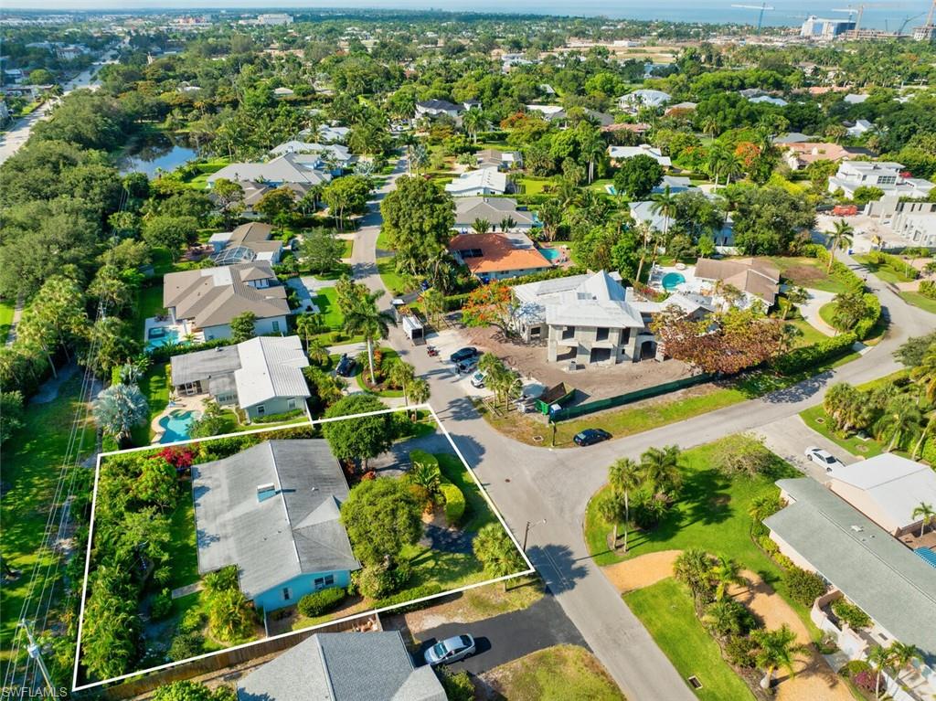 Charming three-bedroom, two-bathroom ranch-style home with western exposure, located in the highly desirable Coquina Sands neighborhood. Currently, it’s the best-priced single-family home in Coquina. It’s ideal location west of 41 is just minutes from Lowdermilk Beach Park and the Moorings Golf and Country Club. Conveniently situated, it is a short drive to Mercato’s shopping and restaurant district and just minutes from downtown 5th Avenue and 3rd Street, offering vibrant nightlife, shops, and restaurants. This home is perfect for investors and offers versatile options: enjoy it as is, lease it out, or start with a blank canvas to build your dream home. This home also features a newer roof, installed in 2019, along with an HVAC system updated in 2014.