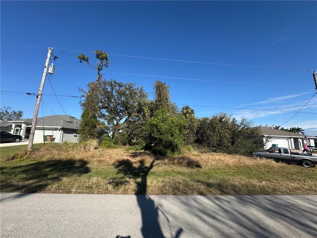 Build your dream home in Cape Coral! This vacant residential lot comes with approved building plans, offering an excellent opportunity to bring your vision to life while saving time in the planning process. Whether you’re looking to build a custom home or invest in Southwest Florida real estate, this property offers exciting potential. Contact the listing agent for additional information regarding the approved plans and project details. Don’t miss this opportunity to secure your piece of Cape Coral!