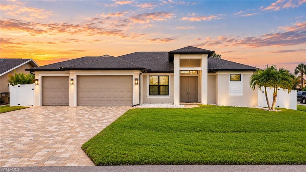 One or more photo(s) has been virtually staged, AI generated or rendered.  Beautiful Southwest Cape Coral pool home offering privacy, comfort, and an exceptional location near some of the area's most desirable amenities. This well-maintained residence features 3 bedrooms, 2 bathrooms, a spacious den, approximately 1,817 square feet of living space, and an oversized 3-car garage, providing ample room for vehicles, storage, hobbies, or a workshop. The versatile den is ideal for a home office, media room, playroom, or can easily serve as a guest space to accommodate family and friends. Enjoy the Florida lifestyle from your private screened-in pool area, perfect for relaxing, entertaining, and year-round outdoor living. The home has been thoughtfully updated with a new air conditioning system, new water heater, new pool heater, and new pool pump, giving the next owner added peace of mind and reducing the need for major improvements. The backyard has been enhanced for both privacy and enjoyment with a new vinyl privacy fence, mature Areca palms providing additional natural screening, and productive avocado and lemon trees, creating a peaceful outdoor retreat. Ideally located in highly sought-after Southwest Cape Coral, you'll be just minutes from Cape Harbour, Tarpon Point Marina, waterfront dining, shopping, parks, boating, and everyday conveniences. With its flexible den, private pool, oversized 3-car garage, new major mechanical systems, beautifully landscaped backyard, and outstanding Southwest Cape Coral location, this home offers the perfect combination of comfort, functionality, and Florida living.