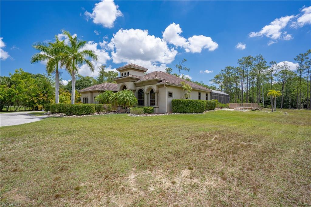 YOUR PRIVATE OASIS IN THE HEART OF FORT MYERS!
Discover the perfect blend of privacy, space, and convenience with this exceptional estate situated on 3.26 acres in the heart of Fort Myers! Tucked away behind a gated entrance, this beautifully designed 4-bedroom, 3.5-bath home with a bonus room and den offers an incredible opportunity to enjoy peaceful estate living while remaining close to everything Southwest Florida has to offer.
From the moment you enter, you’re greeted by stunning views of the expansive screened pool and spa area, setting the stage for the indoor-outdoor lifestyle that makes Southwest Florida so desirable. The formal living and dining rooms provide elegant spaces for entertaining, while the spacious kitchen opens to the family room, offering beautiful views of the pool and outdoor living areas.
Entertaining is taken to another level outdoors! The oversized screened lanai features a sparkling pool, relaxing spa, outdoor kitchen, and fireplace, creating the perfect setting for gatherings year-round. Just beyond the pool area, an expansive entertaining deck with a fire pit provides even more space to relax, unwind, and enjoy the Florida lifestyle.
The property is mostly cleared, offering plenty of usable outdoor space, while a beautiful natural cypress forest at the rear creates a peaceful backdrop and your own private connection to nature. An oversized three-car garage provides ample room for vehicles, recreational equipment, and all your Florida toys.
Enjoy the convenience of being just minutes from shopping, dining, entertainment, I-75, and Southwest Florida International Airport, with the beautiful Gulf beaches approximately 30 minutes away.
Privacy, acreage, nature, and exceptional entertaining spaces all in one remarkable Fort Myers property. Whether you’re hosting family and friends, relaxing poolside, or simply enjoying the tranquility of your own acreage, this home delivers a lifestyle that’s increasingly hard to find in such a convenient location.
Your Southwest Florida oasis awaits!