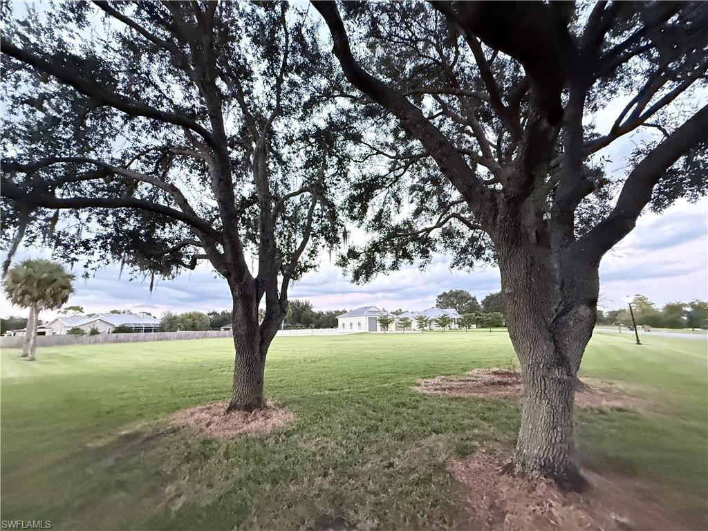 Build Your Dream Home in Peaceful Alva!

Discover an exceptional opportunity to create your own private retreat in Riverwind Cove, one of Alva’s beautiful residential communities. Situated on a generous .96 acre corner homesite, this property combines space, privacy and the timeless natural beauty of Old Florida.

Mature oaks and sabal palms create a picturesque setting for a custom residence with ample room for a pool, expansive outdoor living areas and beautifully landscaped grounds. Here, mornings can begin surrounded by nature and evenings can end beneath the stars, offering a sense of tranquility that has become increasingly difficult to find in Southwest Florida.

Alva is treasured for its peaceful countryside, historic charm, open spaces and proximity to the Caloosahatchee River. Boating, fishing, kayaking, equestrian activities and miles of nearby recreational trails make this an ideal setting for those who appreciate an active outdoor lifestyle while still enjoying convenient access to Fort Myers and the amenities of Southwest Florida.

The property is located in Flood Zone X, where flood insurance is typically not required by a lender, and offers nearly one full acre on which to bring your vision to life.

For the buyer seeking privacy, natural beauty and room to create something truly special, this Riverwind Cove homesite offers a rare opportunity to enjoy the quieter, more gracious side of Southwest Florida living.