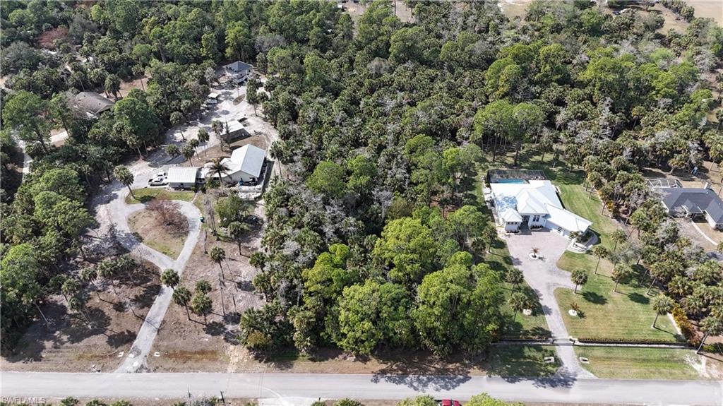 FANTASTIC and HIGHLY DESIRED AREA - CURRY ISLAND * MILLION DOLLAR + HOMES ON THIS STREET * UPLAND IN FRONT and BACK per 2026 ENVIRONMENTAL * SURROUNDED BY OVERSIZED LOTS - GREAT FOR PRIVACY * CONTAINS SOME X and X500 FLOOD ZONE * GREAT SUNSETS FROM YOUR FUTURE BACK PORCH and POOL with THE BACK OF THIS LOT FACING WEST * ONE HOME and ONE GUEST COTTAGE and AG PURPOSES ALLOWED * Click on the two drone video / virtual tour links to see this gorgeous lot twice from different angles.