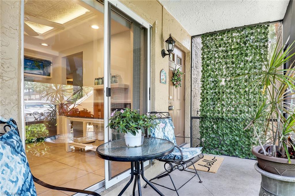 Offered turnkey furnished with desirable western exposure, this spacious, light-filled first-floor condominium presents an exceptional opportunity to enjoy the Naples lifestyle with low fees, resort-style amenities and outstanding convenience. Featuring two bedrooms, two full baths and 1,246 square feet of thoughtfully designed living space, this inviting residence offers a comfortable blend of updated interiors, ample interior storage, complemented by additional storage conveniently located just outside the unit. and effortless indoor-outdoor living. Ideally situated near Starbucks, Publix and local restaurants, and just a short drive from Fifth Avenue South and Naples’ renowned Gulf beaches, the location appeals equally to seasonal enjoyment, year-round living or rental income potential. Inside, an open, airy atmosphere is enhanced by abundant natural light, newer wood-grain vinyl flooring and ceiling fans throughout. The renovated kitchen features stainless steel appliances and a refreshed design that complements the adjoining living and dining areas, creating an inviting setting for everyday living and entertaining. Sliding glass doors extend the living space to a screened lanai, where western exposure provides a relaxing backdrop for enjoying the afternoon sunshine and evening breezes. The spacious primary suite offers a peaceful retreat with a large walk-in closet and private bath, while the additional bedroom and full bath provide comfortable accommodations for guests. Exceptional storage is a standout feature, with a generous utility room, ample interior closet space and dedicated outdoor storage ideal for bicycles, grills and recreational essentials. Residents enjoy access to an expansive resort-style swimming pool, perfect for relaxing and embracing Southwest Florida’s year-round outdoor lifestyle. With remarkably low fees, turnkey convenience and excellent rental and income potential, this residence offers an appealing combination of comfort, flexibility and value. Its desirable Naples location places everyday conveniences, exceptional dining, boutique shopping and the white-sand Gulf beaches within easy reach, creating an ideal setting for enjoying all that coastal living has to offer.